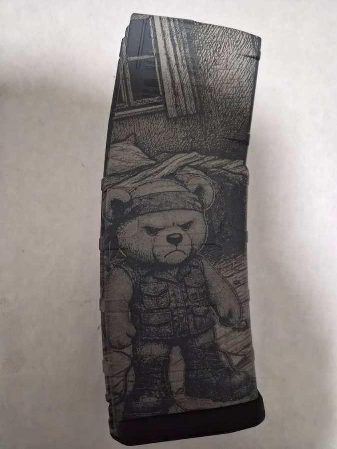 AR magazine laser-engraved with a tactical bear scene