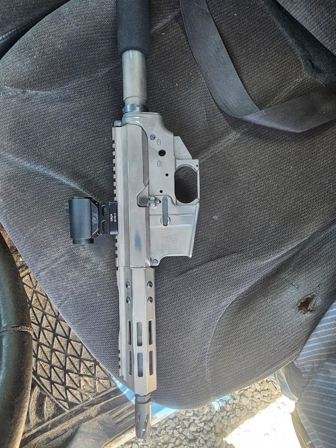 AR upper and lower in raw finish, mid-build