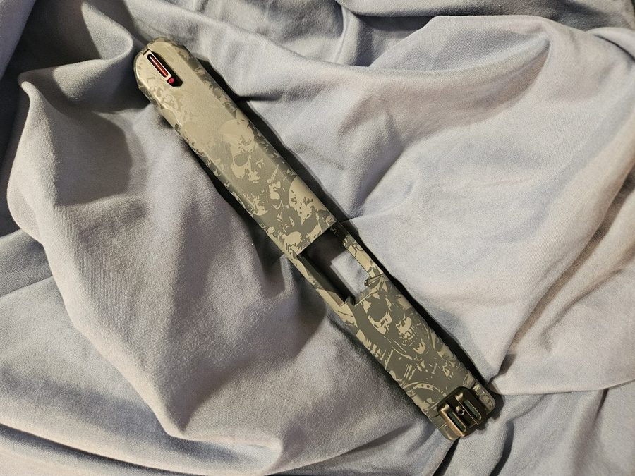 Glock slide in skull-pattern Cerakote, ported, top view